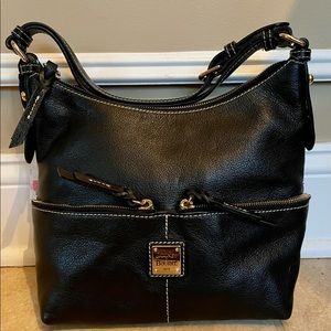 Truly classic black Dooney and Bourke shoulder bag w/ dust cover.